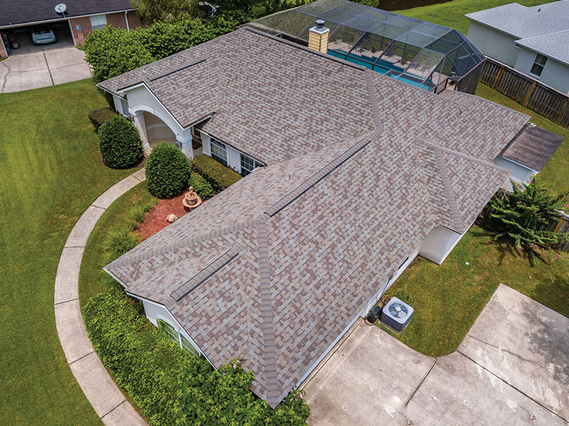 white-two-story-home-with-new-charcoal-black-architectural-roof