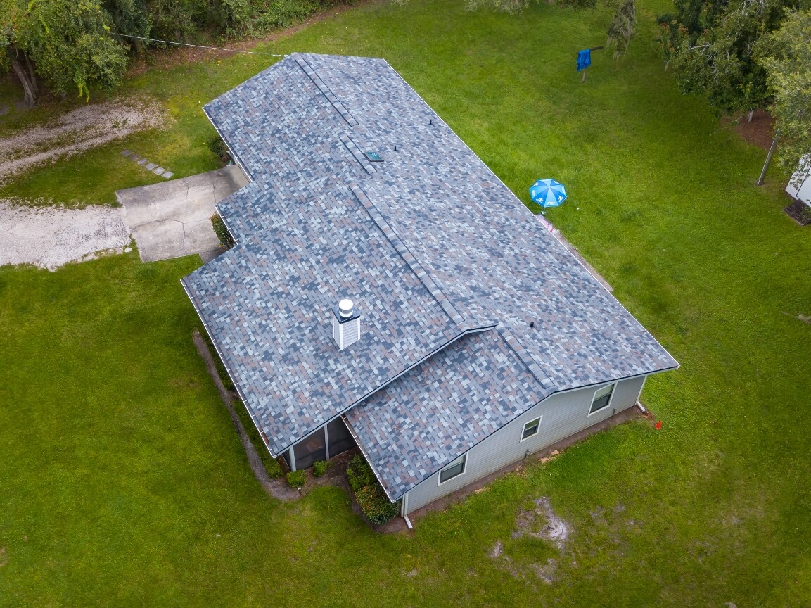 white-two-story-home-with-new-black-architectural-shingle-roof